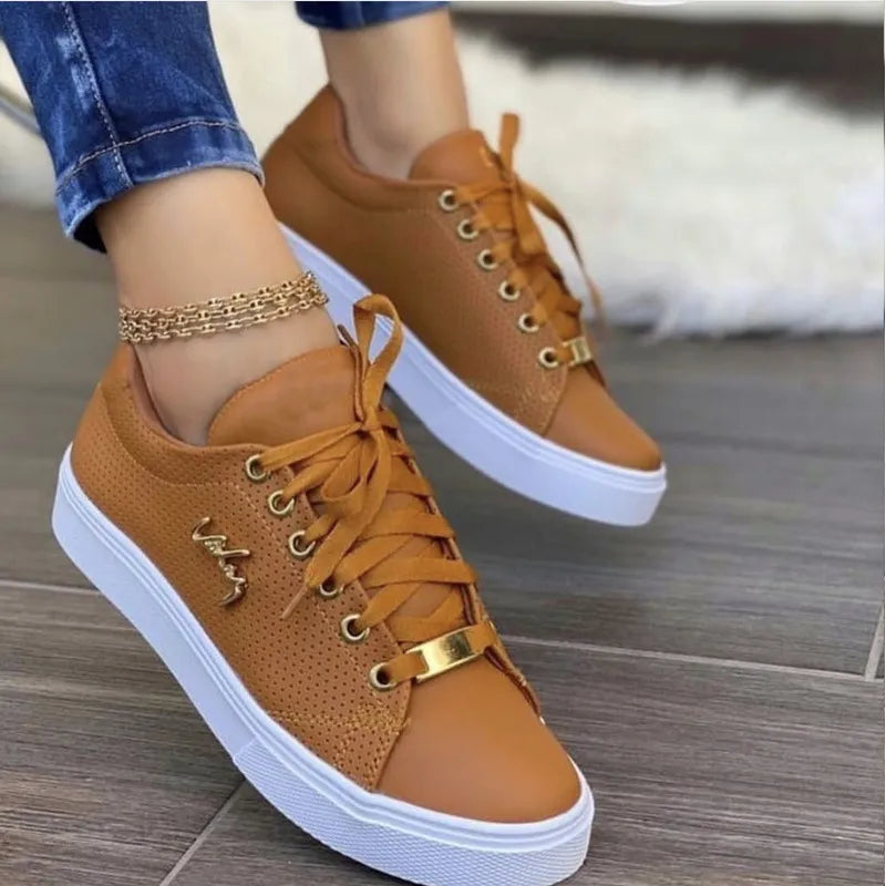 Schlichte Sneaker mit runder Kappe