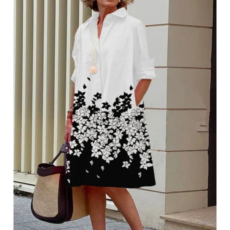 DaniFest Hemdblusenkleid in Weiß und Schwarz mit floralem Print, Kragen, Knopfleiste und praktischen Seitentaschen.